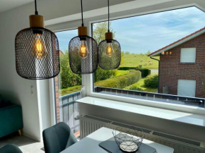 Ferienwohnung Deichblick - Haus Seeschwalbe